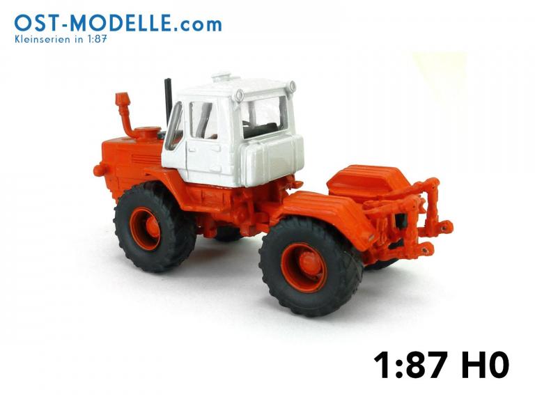 Traktor T150-K rotorange – weiß mit Motorverkleidung